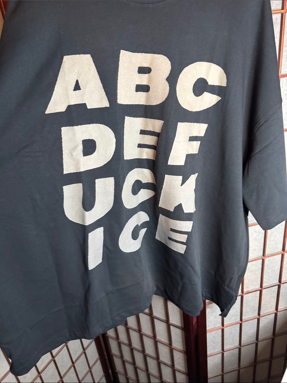 CHNGE Black Short Sleeve Tee with Cream Graphic Letters